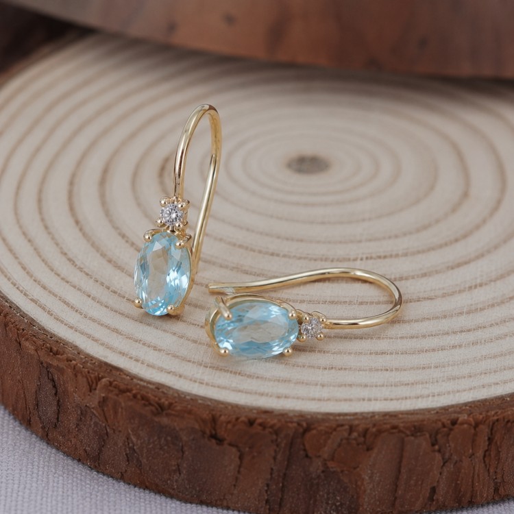 Realistic picture of Real Gold Dangle Earrings with Oval Blue Topaz 6x4 mm and Natural Diamonds