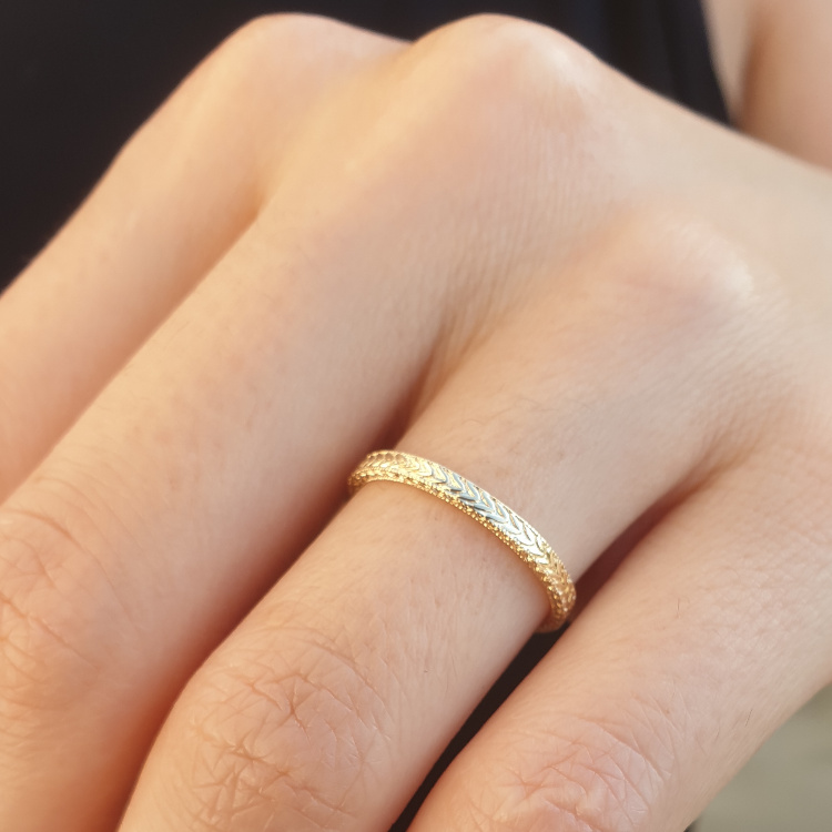 Realistic picture of Thin Gold Wedding Ring with Special Decorations