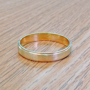 Realistic picture of 14kt Yellow Gold Brushed & Shiny Classic Wedding Band Ring