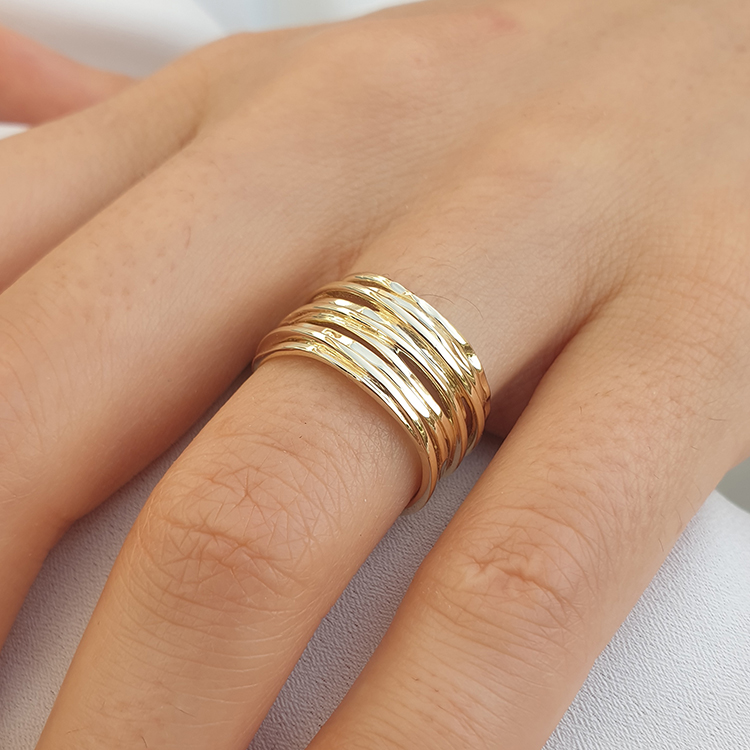 Realistic picture of A special handmade wires design gold 14K wedding ring
